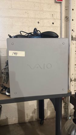 Vintage Sony Vaio with monitors , mice and keyboards