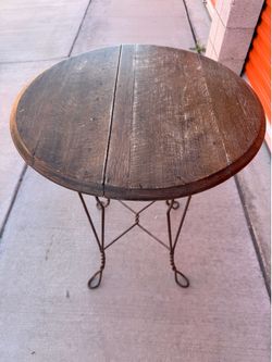 3 legged round wooden, vintage table