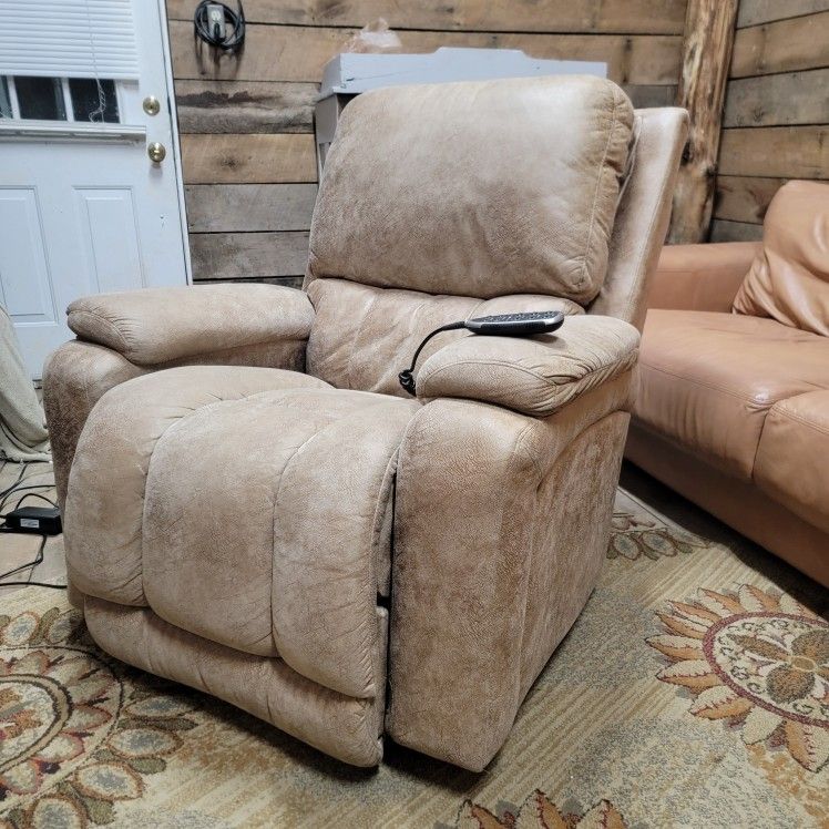 Lay-Z-boy power rocking recliner with adjustable headrest and lumbar.