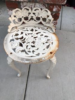 Small white wrought iron satea