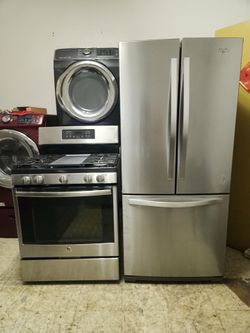 Whirlpool refrigerator30 inches wide  and gas stove set