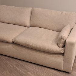 Nice Beige Ashely Furniture Cloud Sofa.