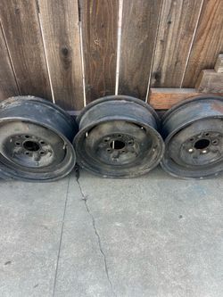 3 Chevy rims with clips 15s