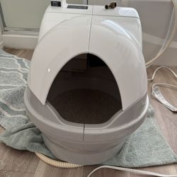 Cat Genie Self Cleaning Litter Box