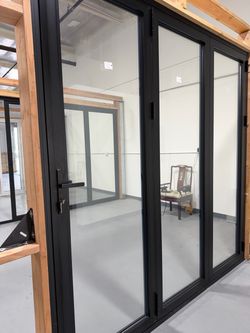 Black Aluminum Framed Glass Bifold Door