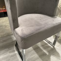 beautiful gray velvet chair with chrome. if its posted it’s available. only msg when ready to pickup