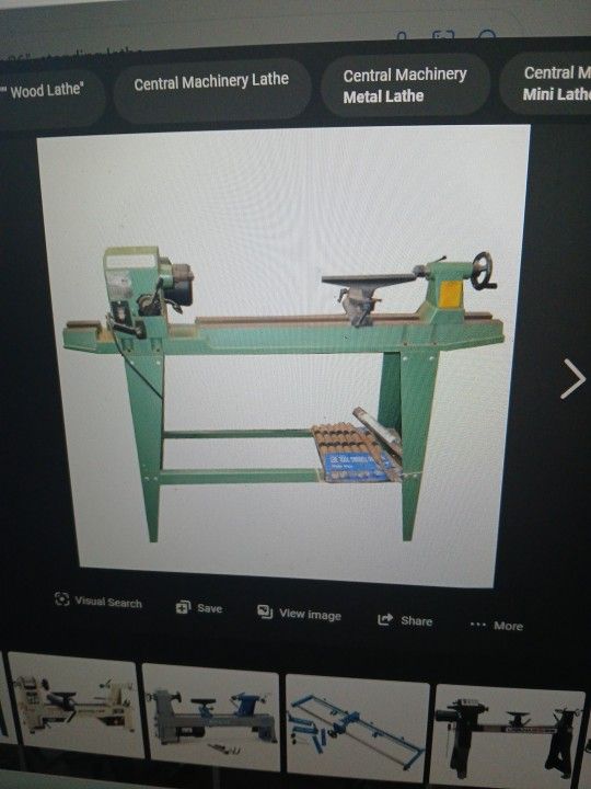Wood Lathe With A Set Of Chizles And Extras