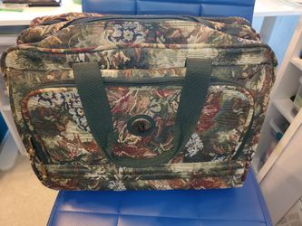 Leisure International Rolling Carry-on Bag