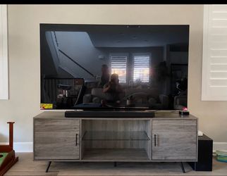 LG 77” OLED TV and mid century modern TV stand