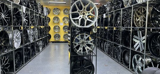 CUSTOM WHEELS WITH MUD GRAPPLERS $10 DOWN