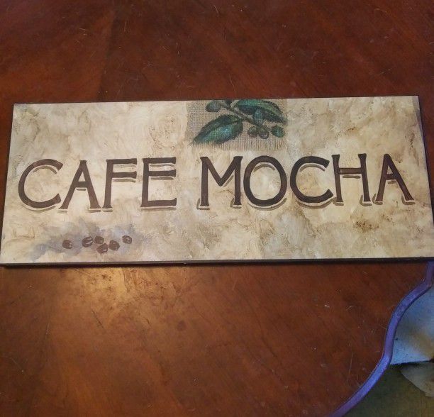 Elegant sign that reads "Cafe Mocha"