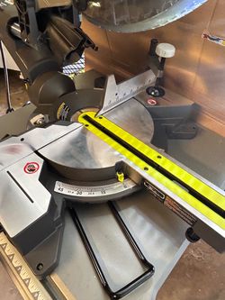 $150$. 15 Amp 10 in. Corded Sliding Compound Miter Saw with LED Cutline Indicator