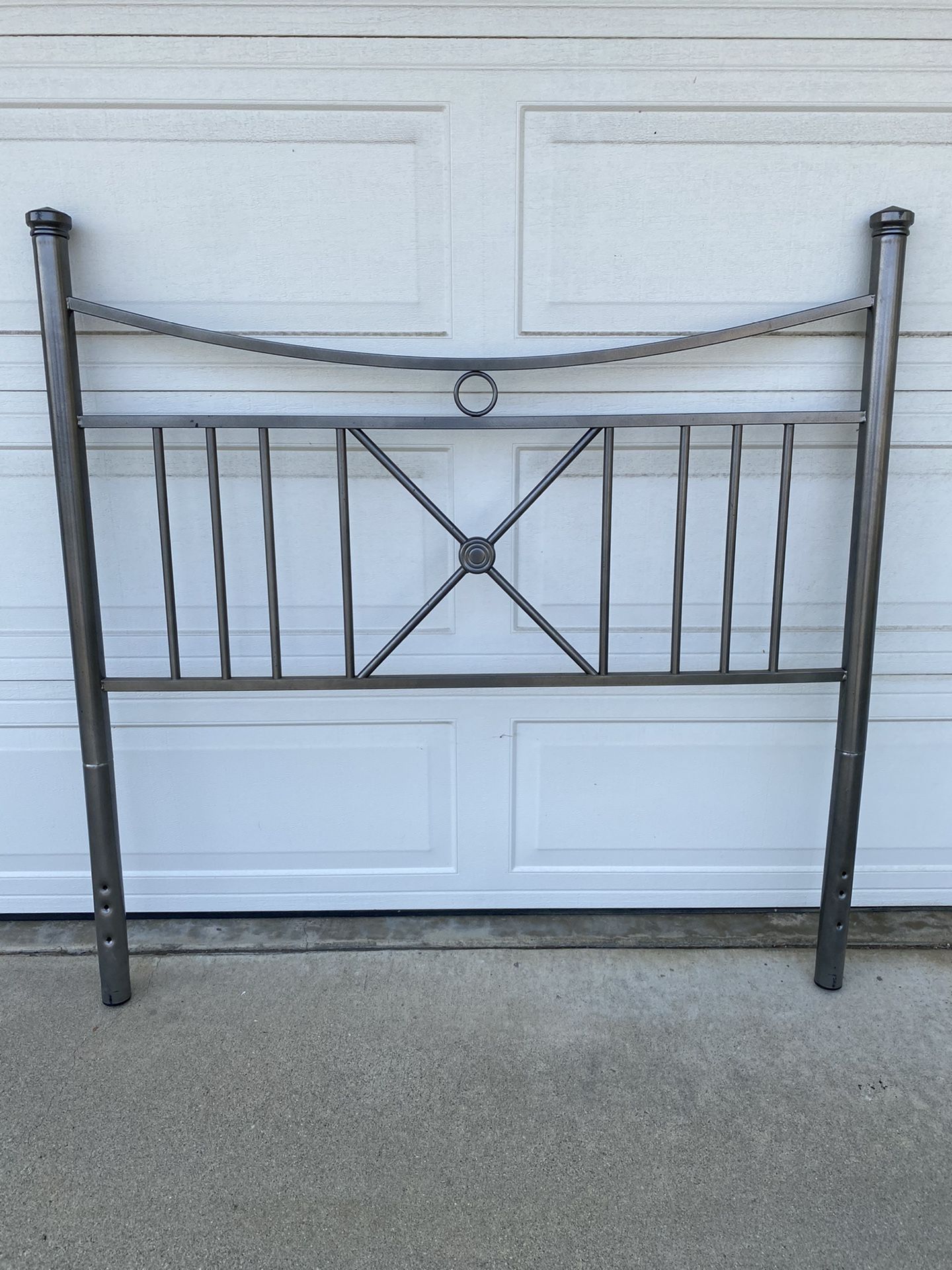 Full size silver head board with side rails.