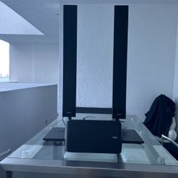 2 Sony speakers and a klipsch speaker (view description)