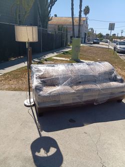 brand new couch come with a lamp still got plastic on it