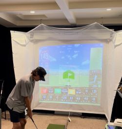 Retractable golf simulator screen
