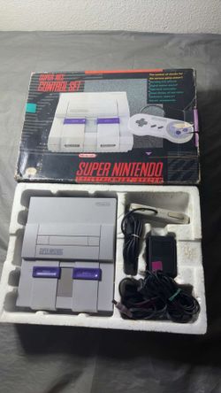 Super Nintendo complete in box with games