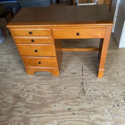 Beautiful 4 Drawer Wooden Desk.   40x18x30”.  Chair Opening 20x24”
