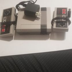 Nintendo Mini complete with 2 controllers use