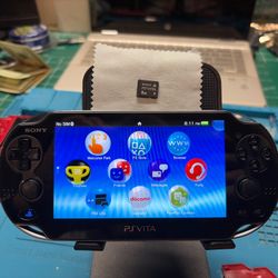 Sony PlayStation Vita PCH-1100 with 8GB Memory Card and charger. Can be enhanced upon request.