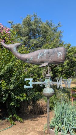 Old copper whale weathervane