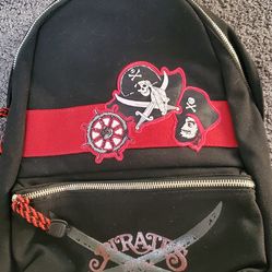 Disneyland Loungefly Pirates of the Caribbean sling backpack