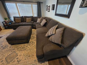 3 piece sectional couch and foot ottoman.