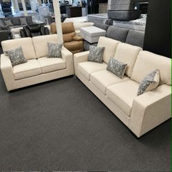 Beige 2 piece sofa and loveseat set