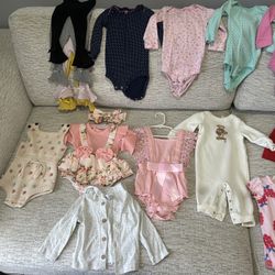 6-9 Month Girl Assorted Clothes/Shoes/Reusable Diapers/Bibs/4 Sippy Cups including straps for them.