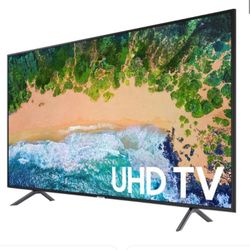 A Samsung - 75" Class - LED - NU7100 Series - 2160p - Smart - 4K UHD TV with HDR  Experience movies in a new way with this 75-inch Samsung television.