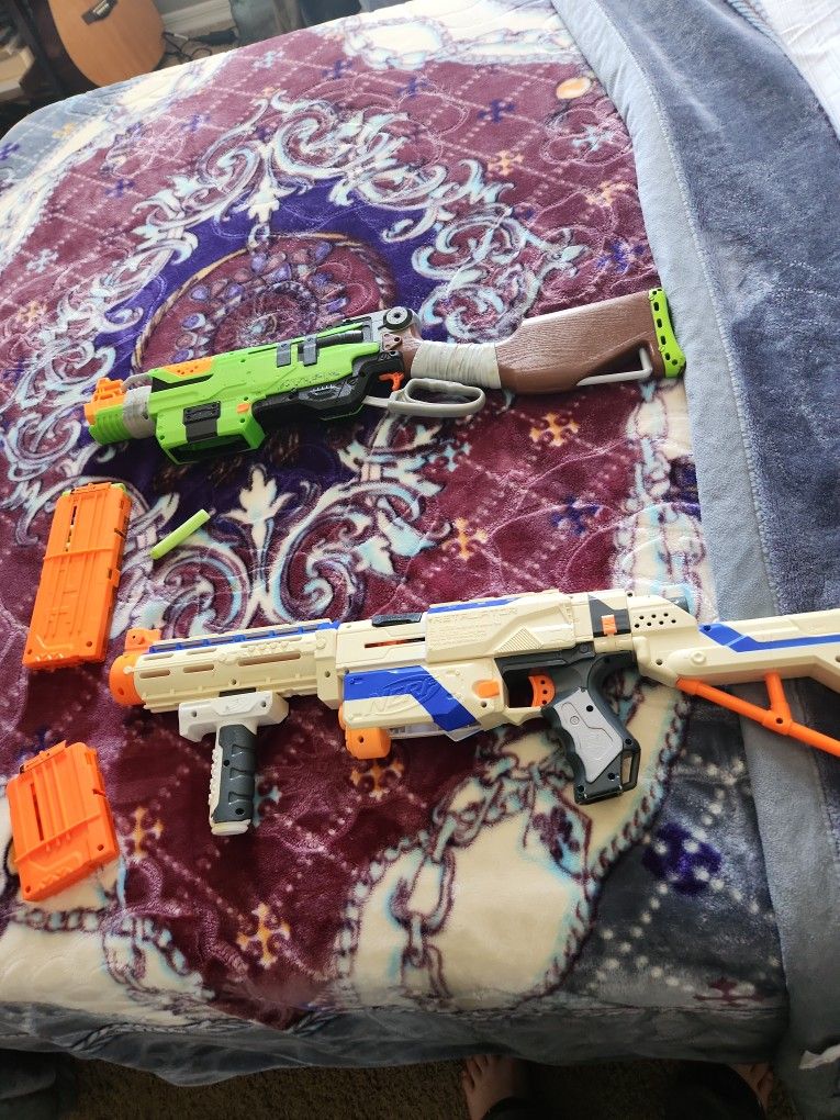 Nerf Guns (Zombie Strike And Retaliator. 2 Mags Included