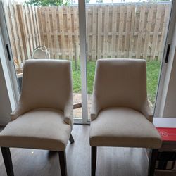4Cream colored chairs