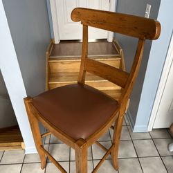Large brown bar stools in pristine condition