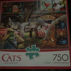 2 Unopened Cat Puzzles 
