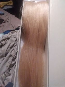 Blonde hair extensions