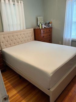 Queen upholstered bed