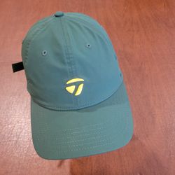 TaylorMade Lifestyle T Bug Golf Hat Green with yellow embroidered log 
OSFA One size fits all. Pre-owned, perfect shape, like new. 97% 
Polyester, 3% 