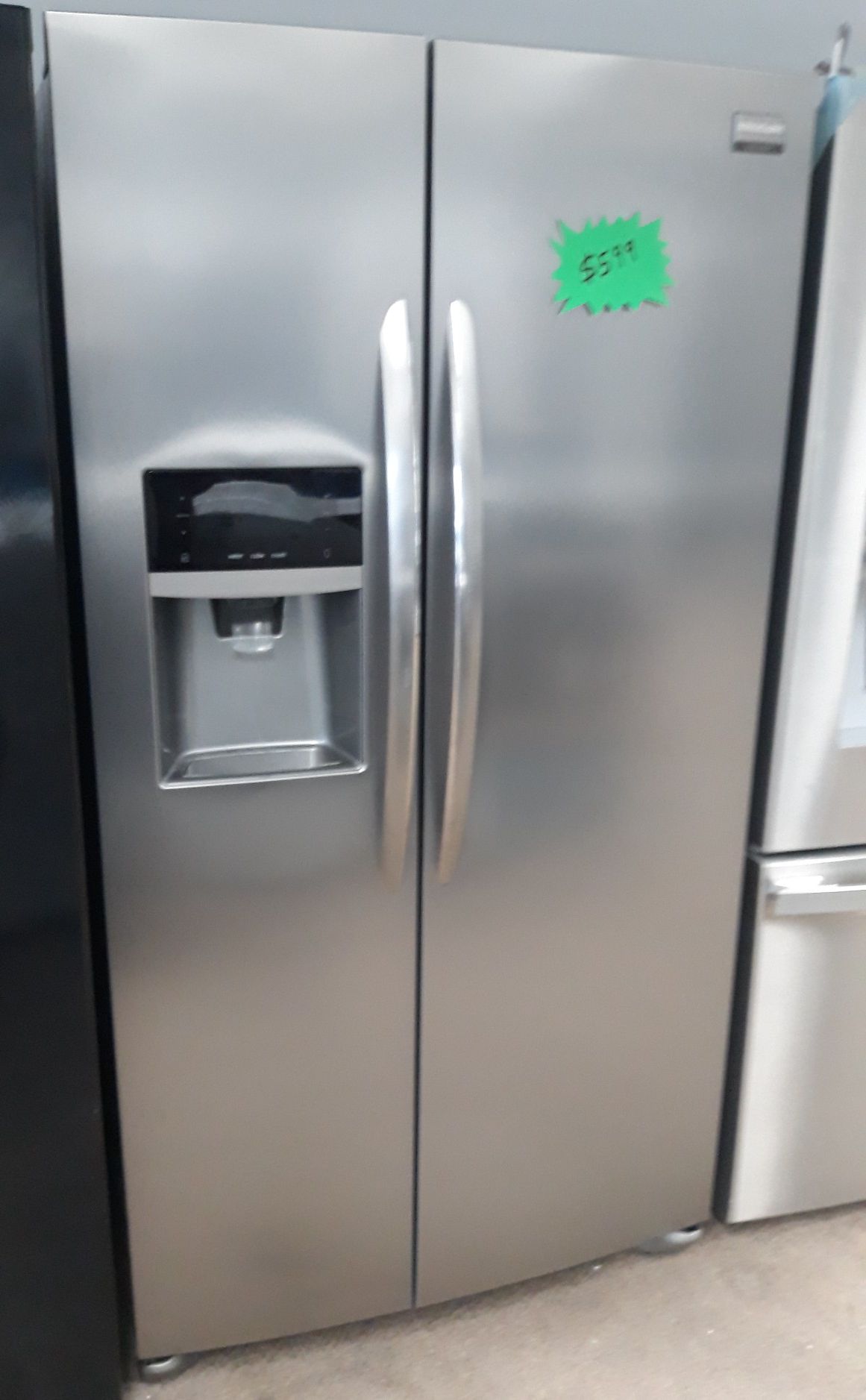 Stainless steel side by side refrigerator excellent condition like new