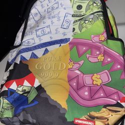 Sprayground Pure Gold Money Collage Backpack