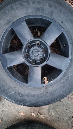 20" nissan black rims and tires