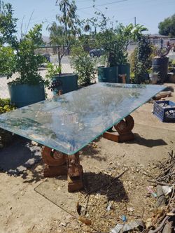 Glass table with leather chairs. OBO