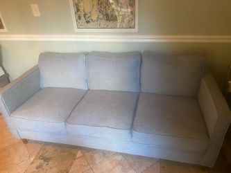 Blue woven fabric couch