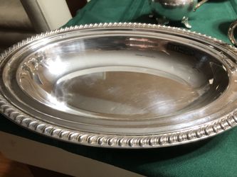 2 silver plates vintage one is Wm Rogers other is the cover