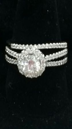 2 live sterling silver wedding solitare set.