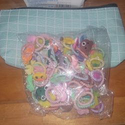 💥NEW  50 PIECES ELASTIC HAIR BANDS. COMES WITH ZIP UP BAG. BOTH PICTURES 