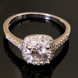 Cubic zirconia ring set in platinum-plated sterling silver