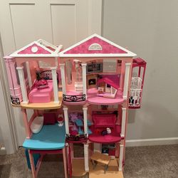 Barbie Dream House with 40+ Barbies, clothing and accessories Lot