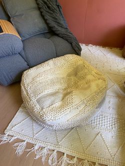 LOW PRICE MOVING- $650 + TAX RETAIL WOOL POUF