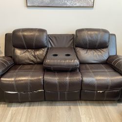 Dual power reclining leather couch and loveseat set