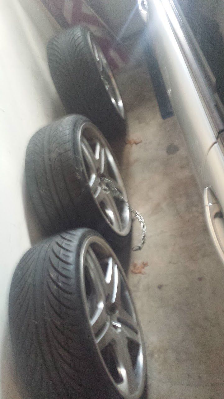Mercedes Benz 20'' inch Rims with tires on them